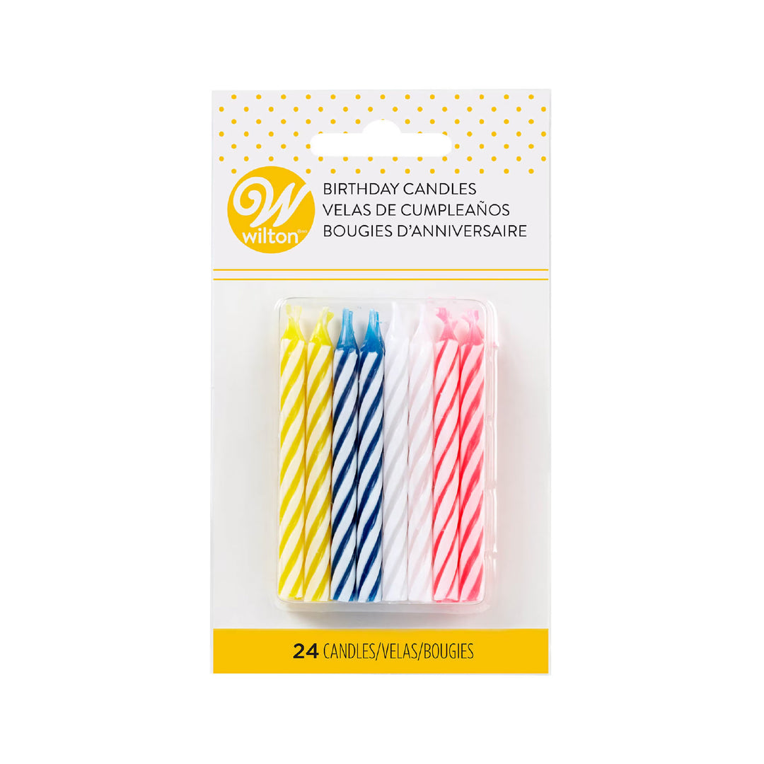 Velas de rayas de colores