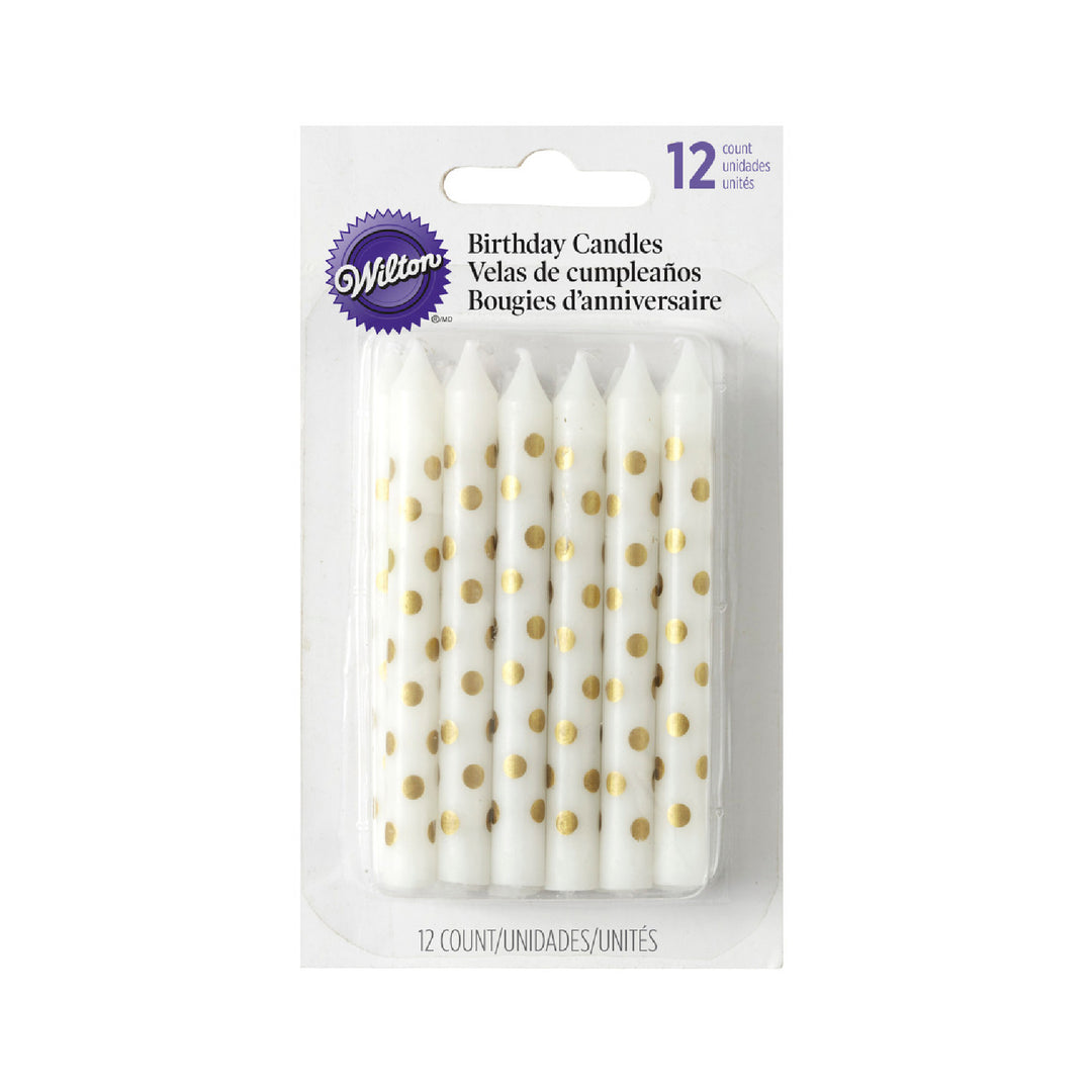 Velas con puntos dorados