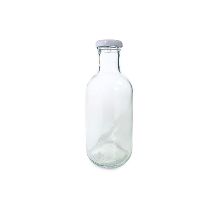 Botella de vidrio con tapa blanca