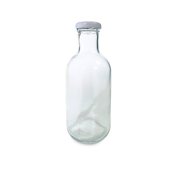 Botella de vidrio con tapa blanca